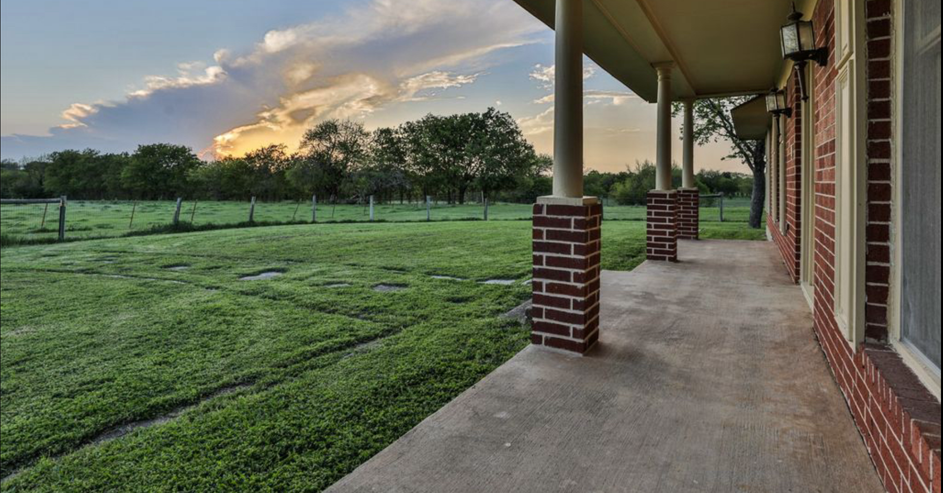 Wraparound porch at sunset, a calm setting for wellness retreats at Safe Harbor Farmstead