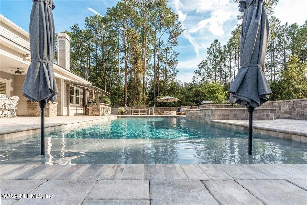 Outdoor swimming pool at 10225 Russell Sampson Road, Saint Johns, Florida