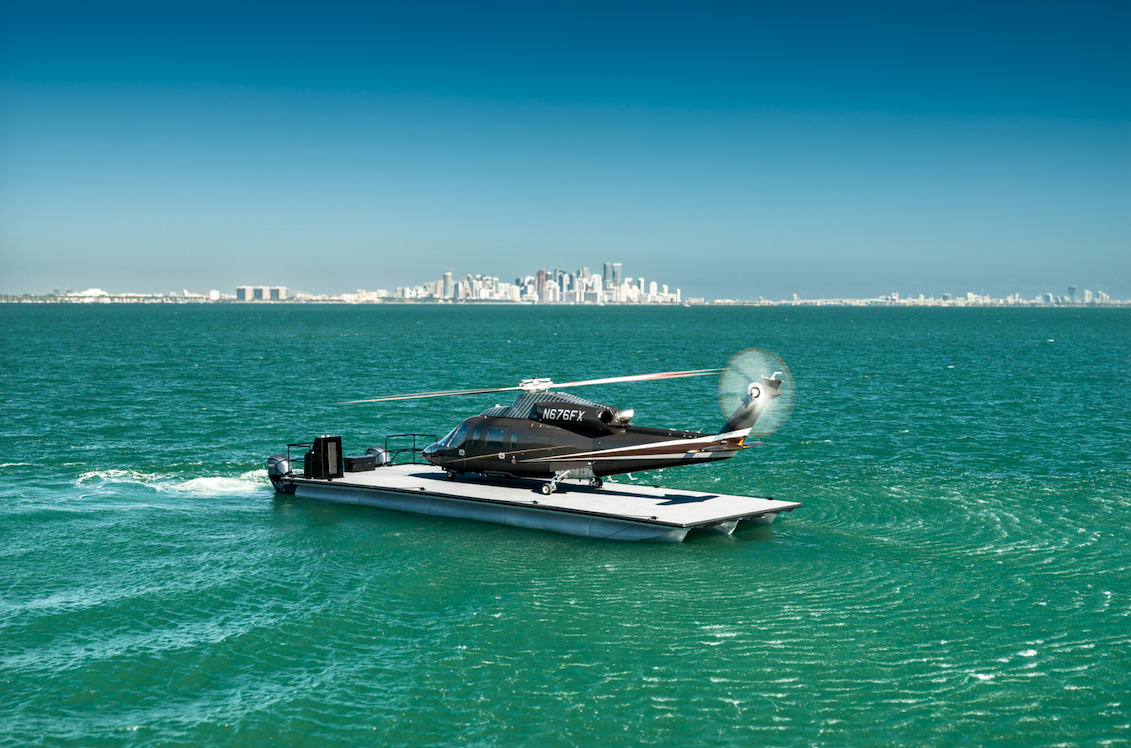 Sikorsky S-76 helicopter arriving on an ILandMiami marine landing platform