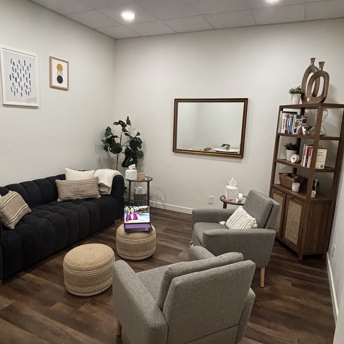 Modern Santa Monica therapy office with neutral decor, sofa seating, and calming minimalist design