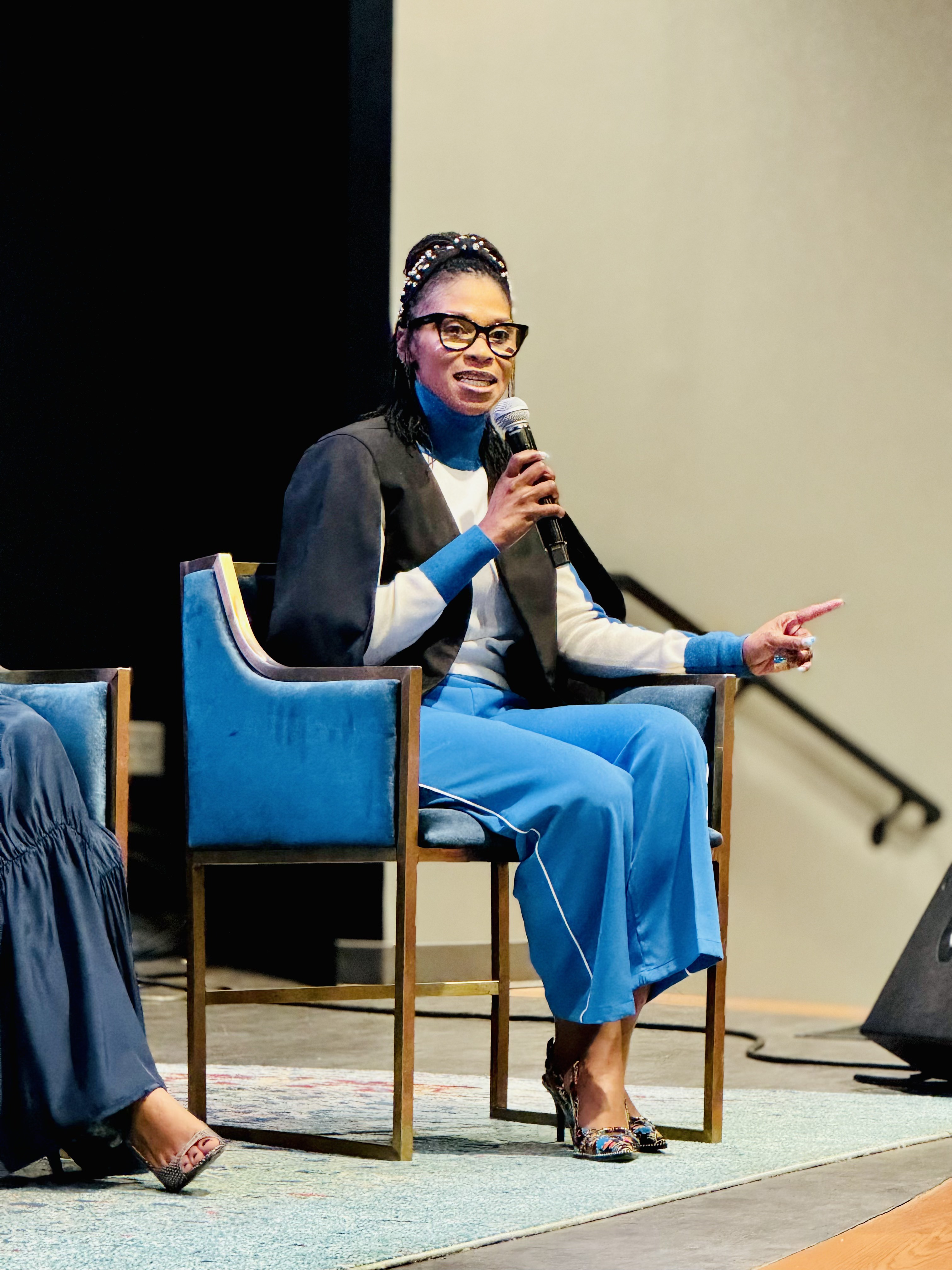 Iesha Berry speaking at a panel event