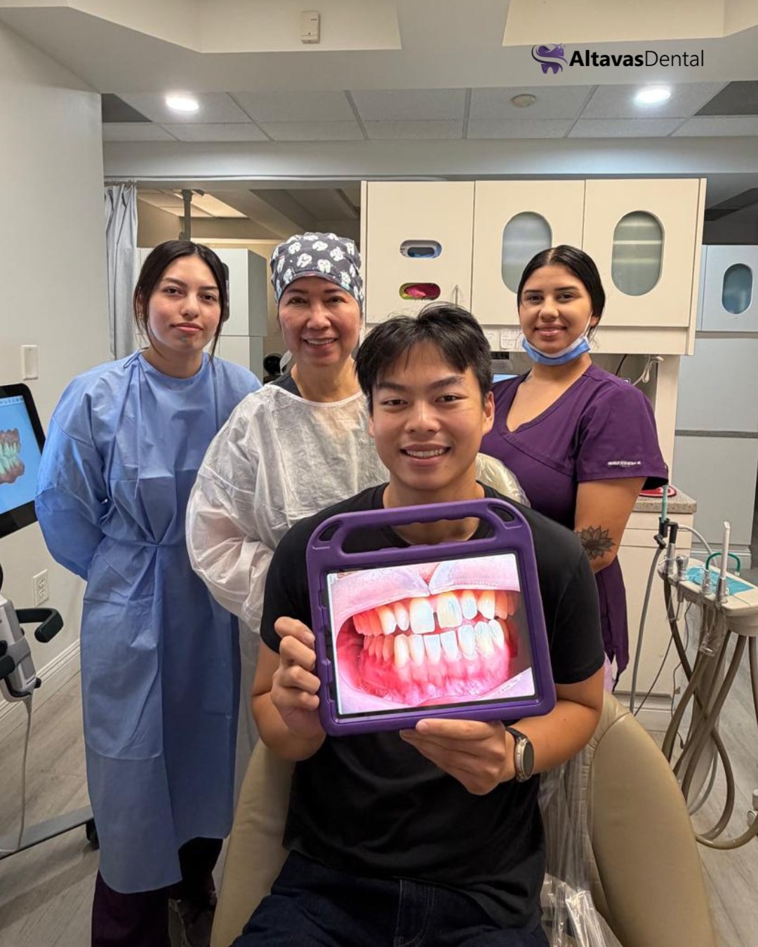 Altavas Dental Invisalign patient holding their before photo