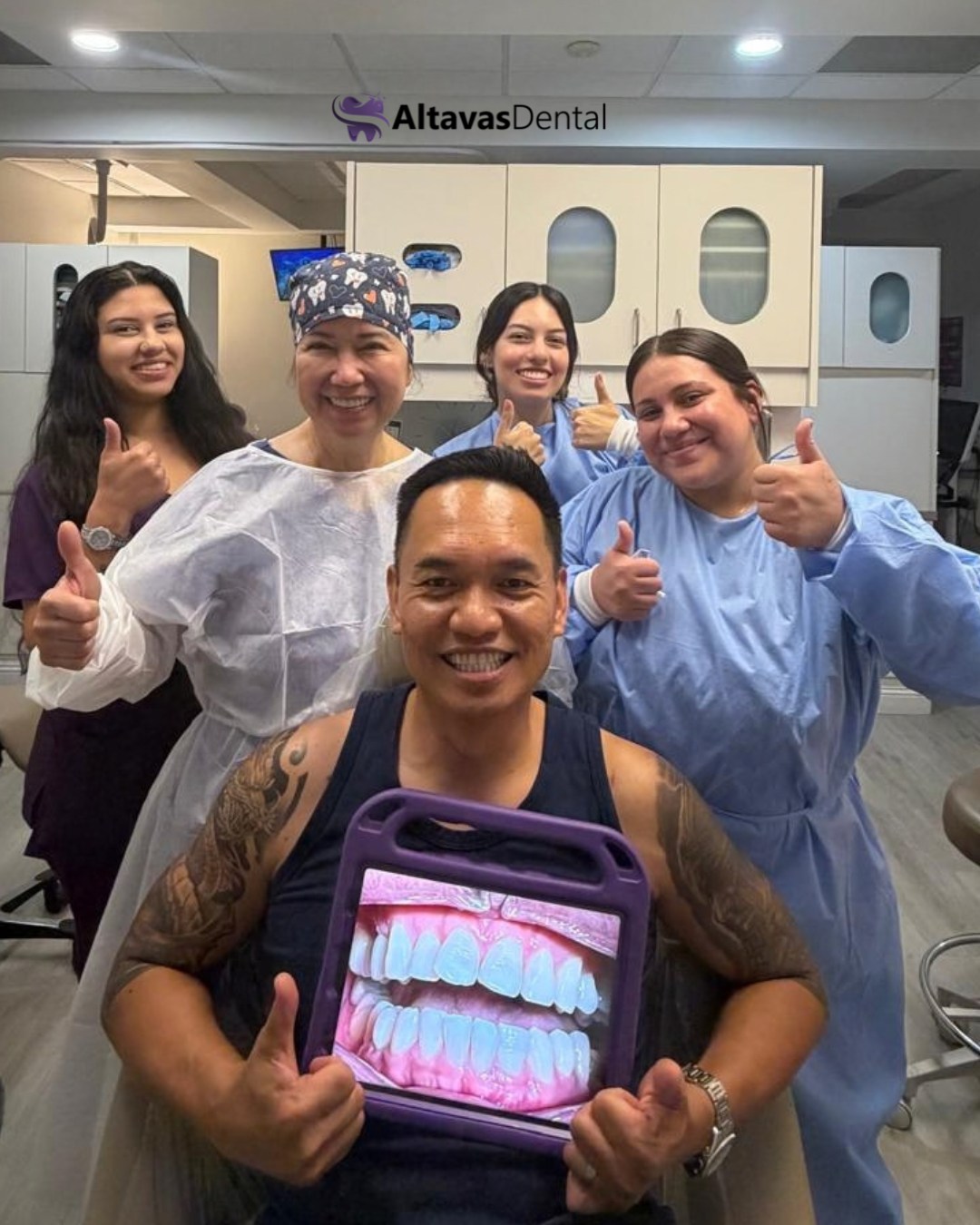 Altavas Dental Invisalign patient holding their before photo
