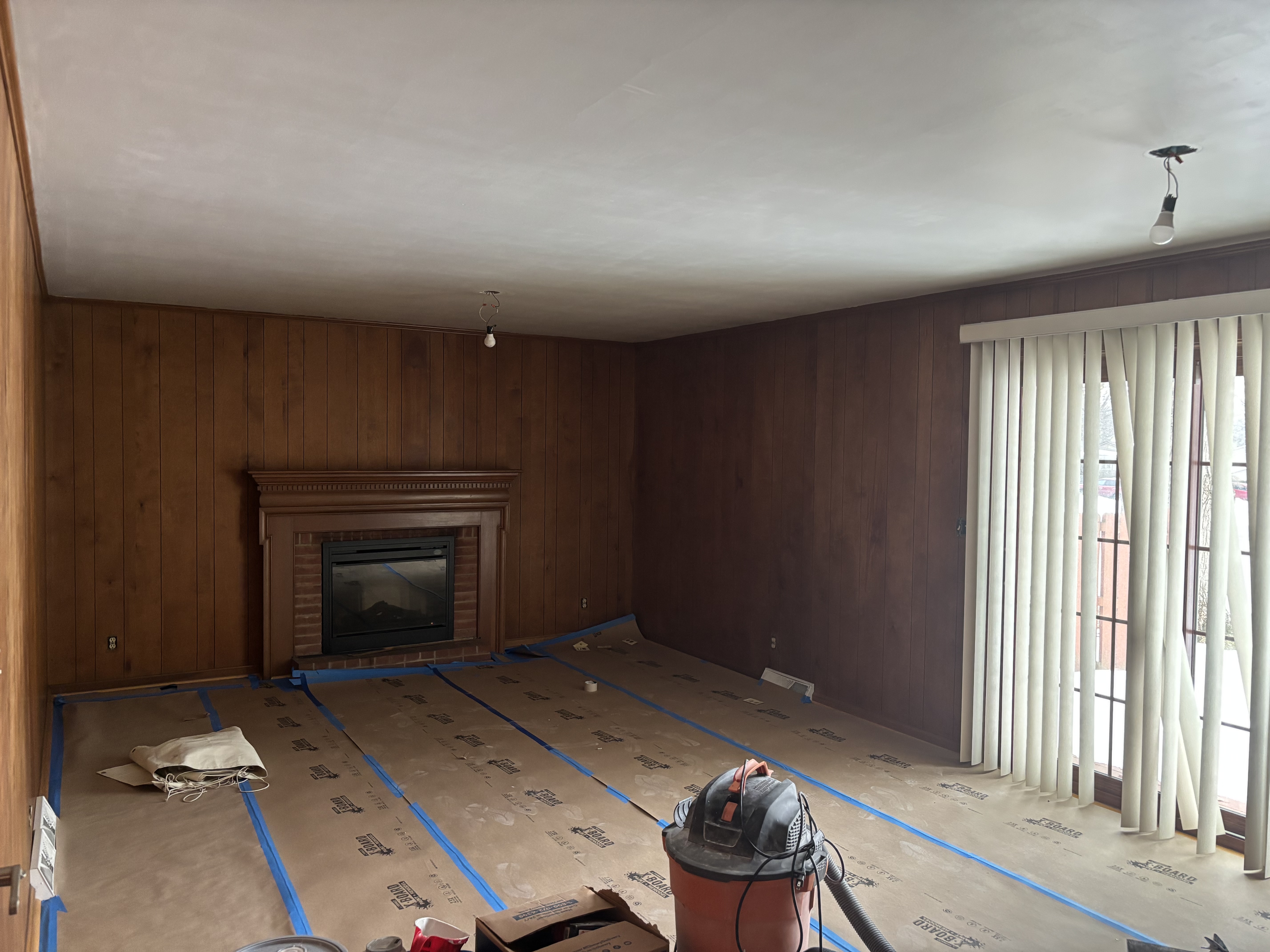 Painter in Youngstown, OH inspecting a room before starting work