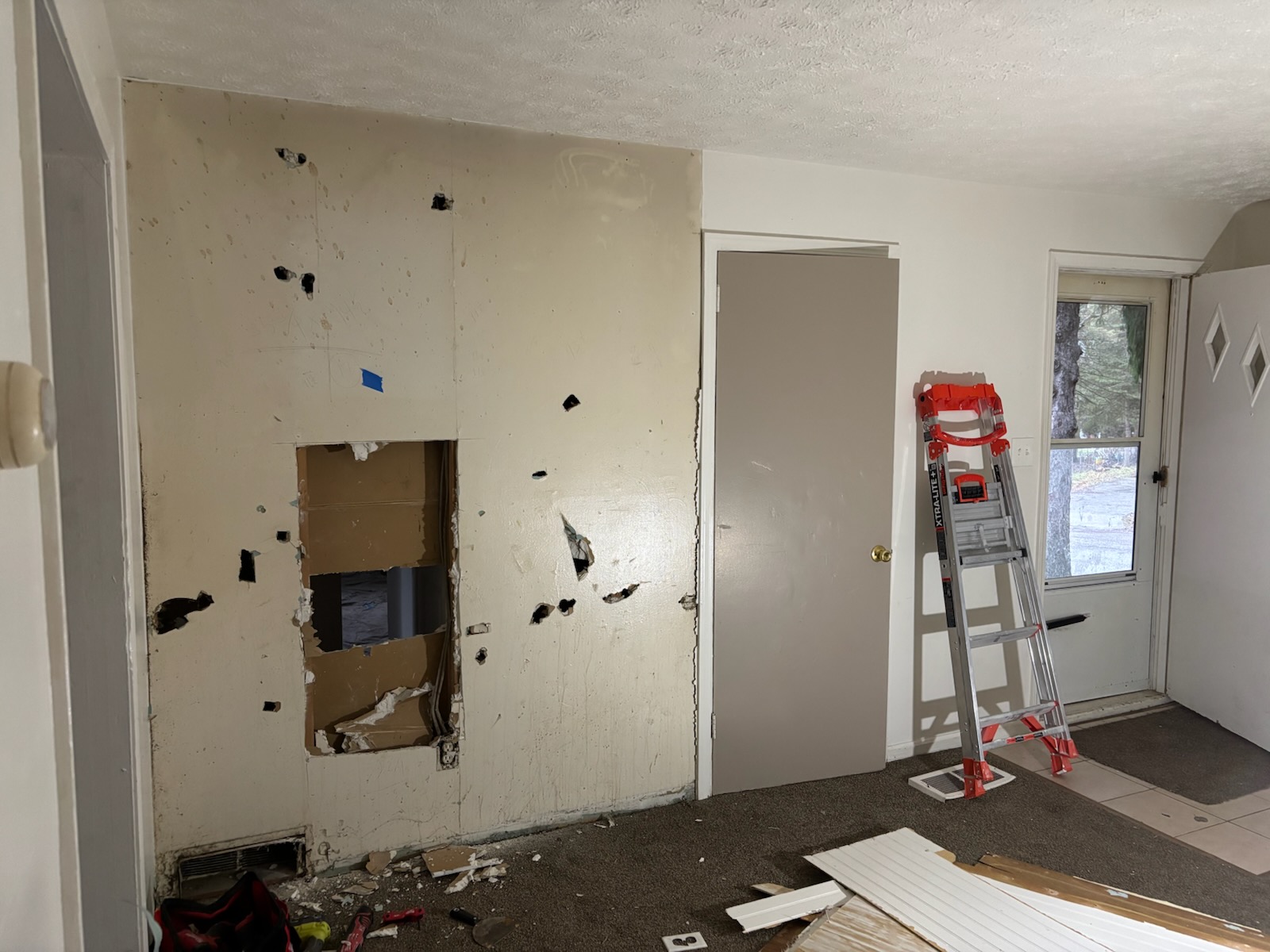 Basement ceiling before spray finish in Youngstown Ohio home