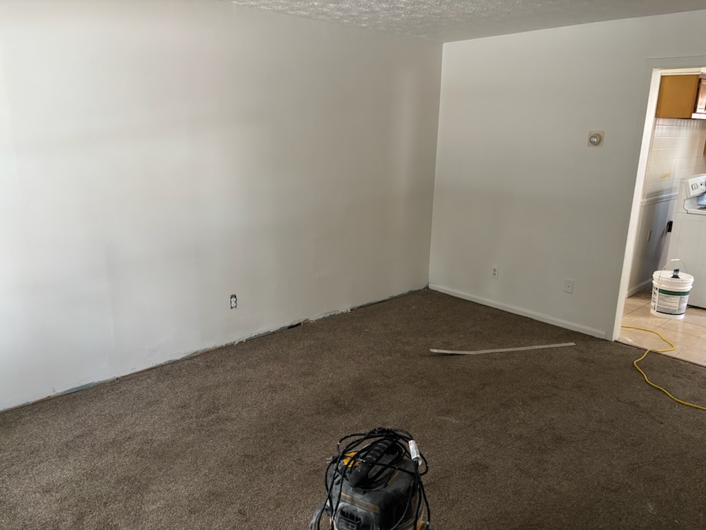 Same wall after drywall repair and fresh paint by New Page Reno in Youngstown Ohio