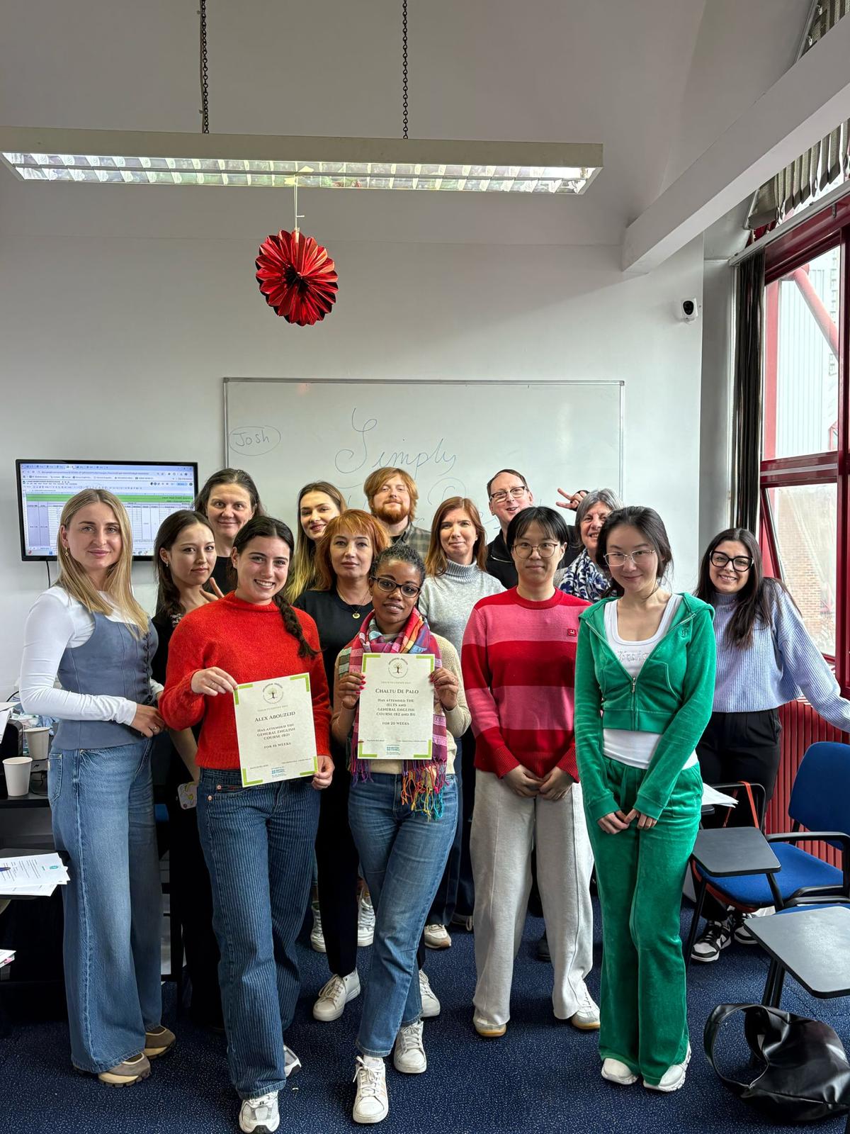 A British teacher with students at Influential English