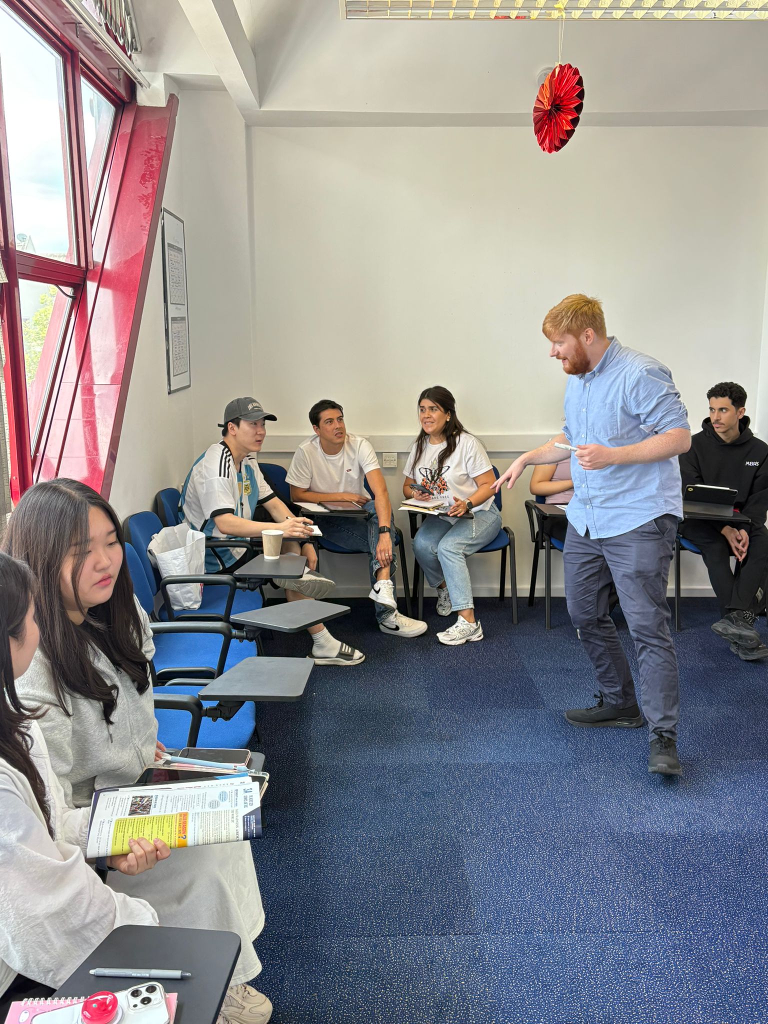 Students and staff at Influential English