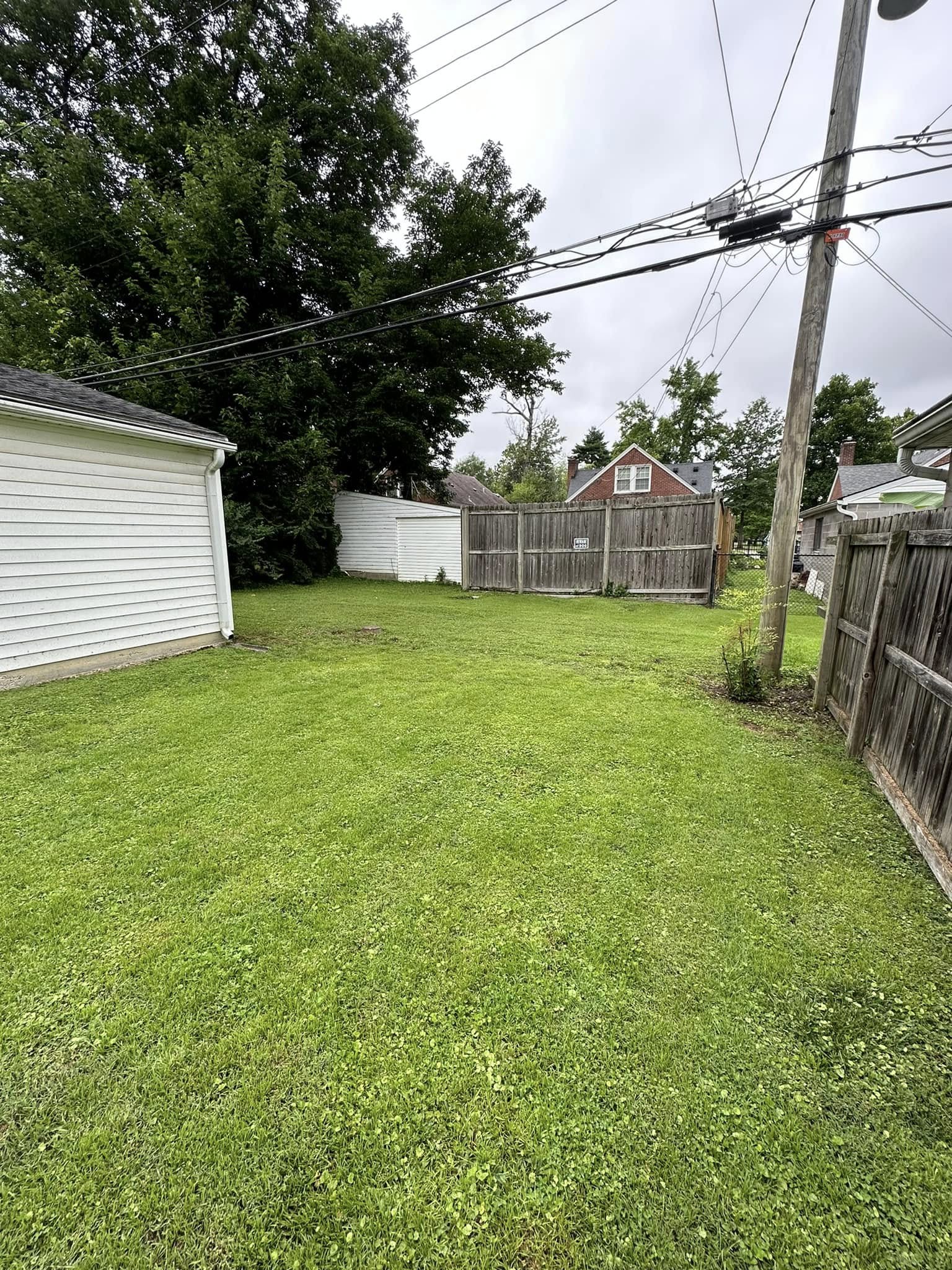 Yard debris and brush piles cleared from a Kentucky property.