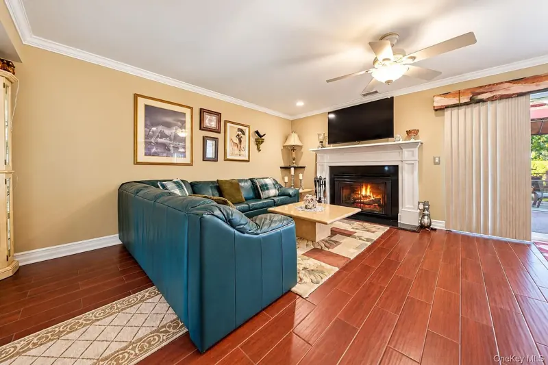 Living room with a wood-burning fireplace