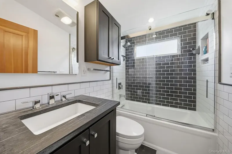 Updated bathroom with a glass shower