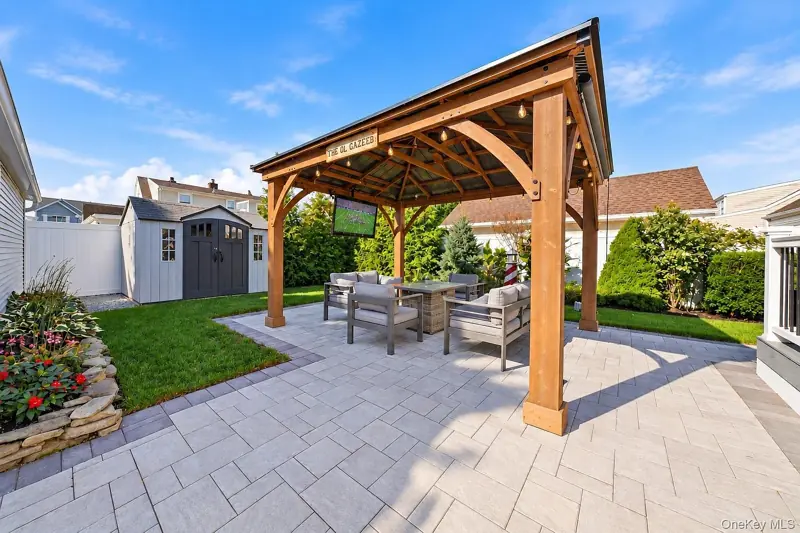 Pergola over the paver patio