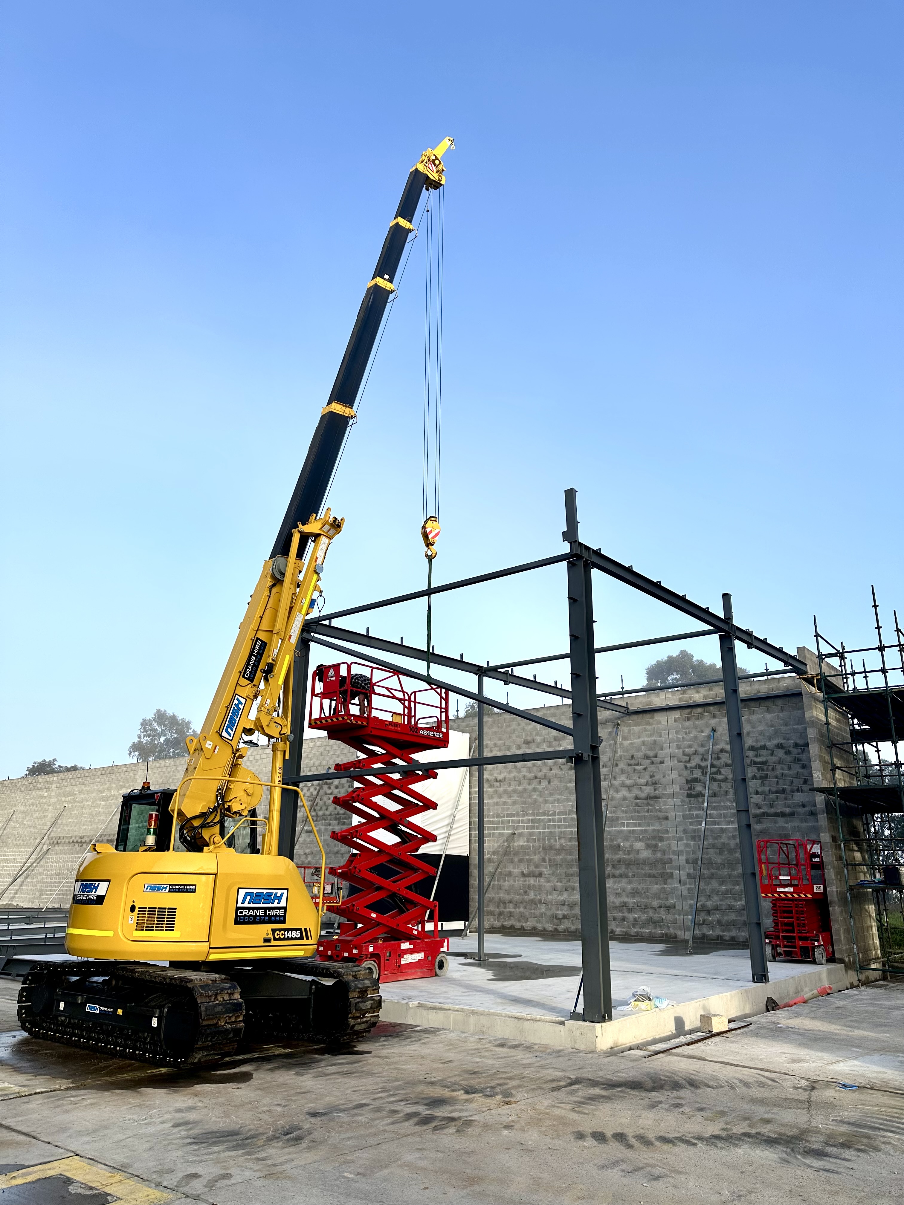 Nash crawler crane positioned for a tight-access lift on a building site