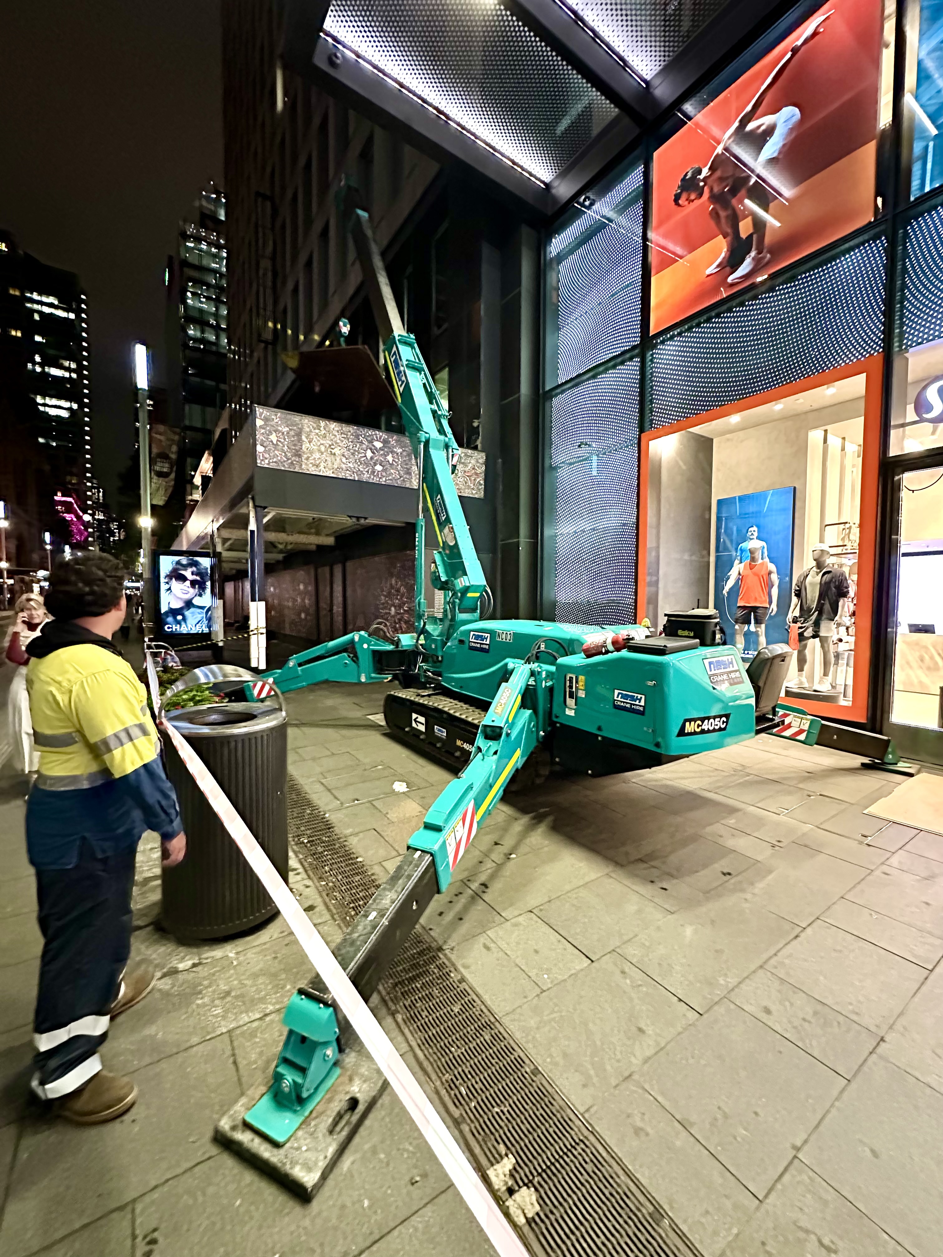 Nash specialist crane operating on a complex project site