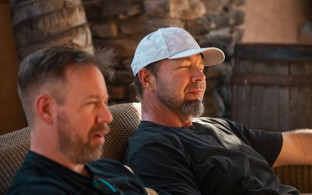 Two men talking
