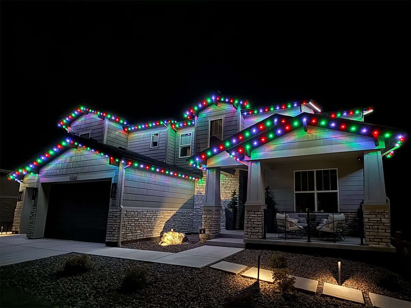 Home lit in full Christmas color by BrightWrx