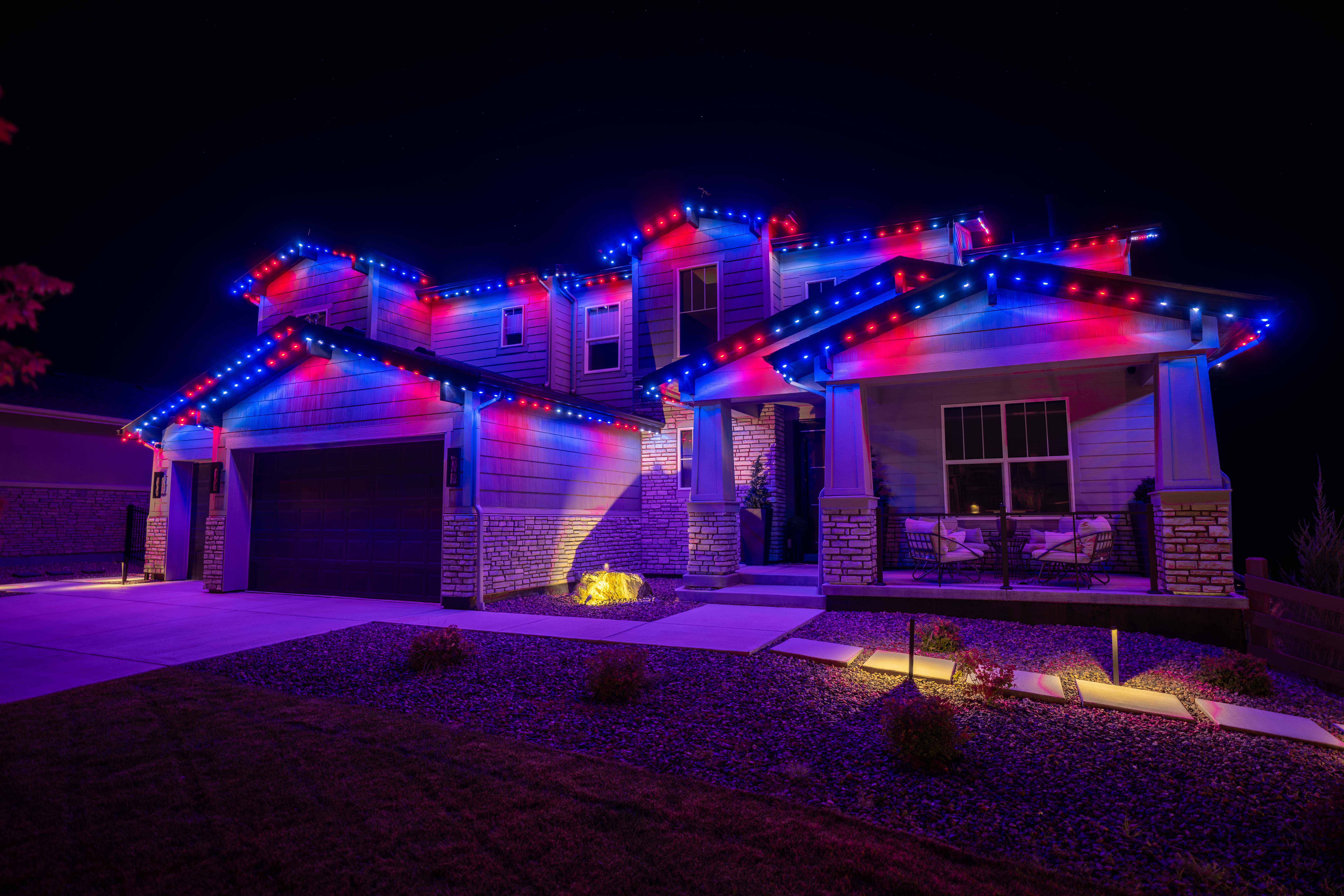 Home lit in red, white and blue