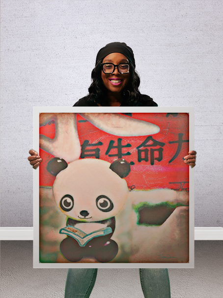 Dr. Stacey Denise holding Panda's Story Time