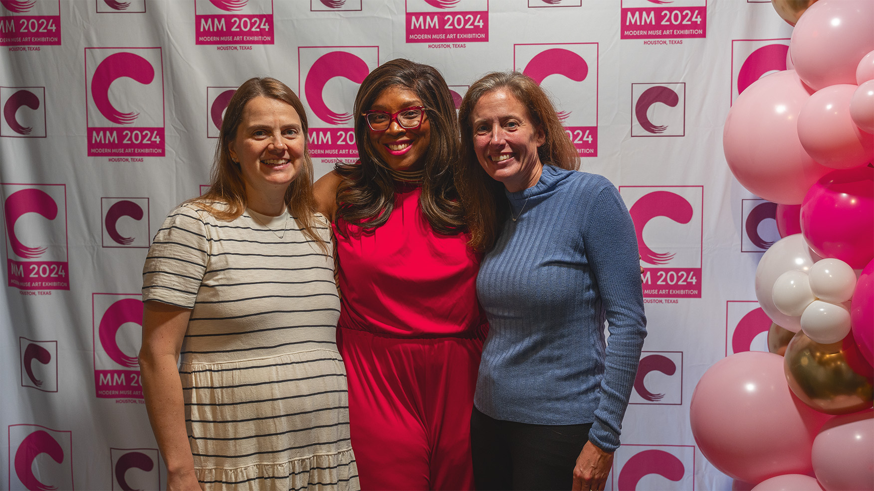 Dr. Stacey Denise with Modern Muse 2024 exhibition attendees