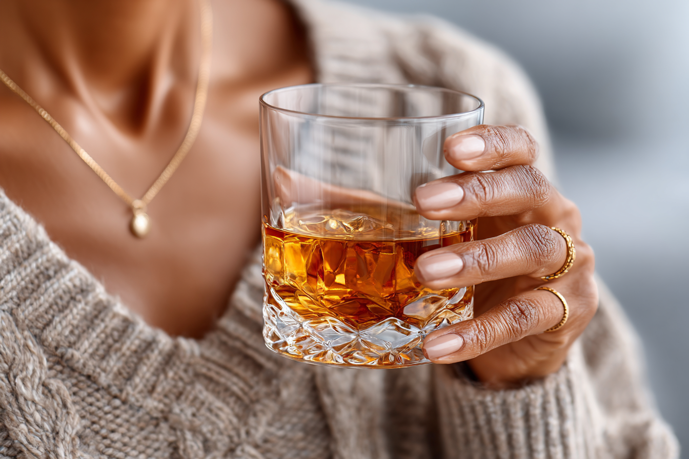 Woman about to drink wine