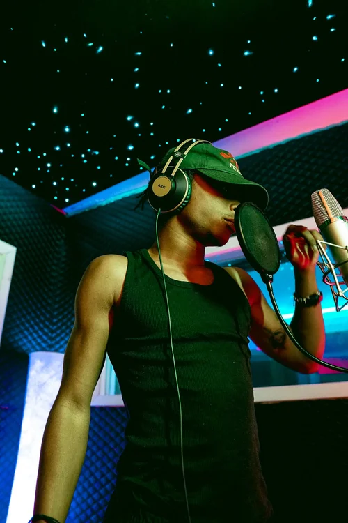 Artist recording vocals at HighLife Studios