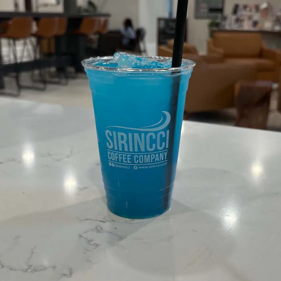 Blue Gummy Shark Jazzed Energy drink over ice in a Sirincci Coffee cup