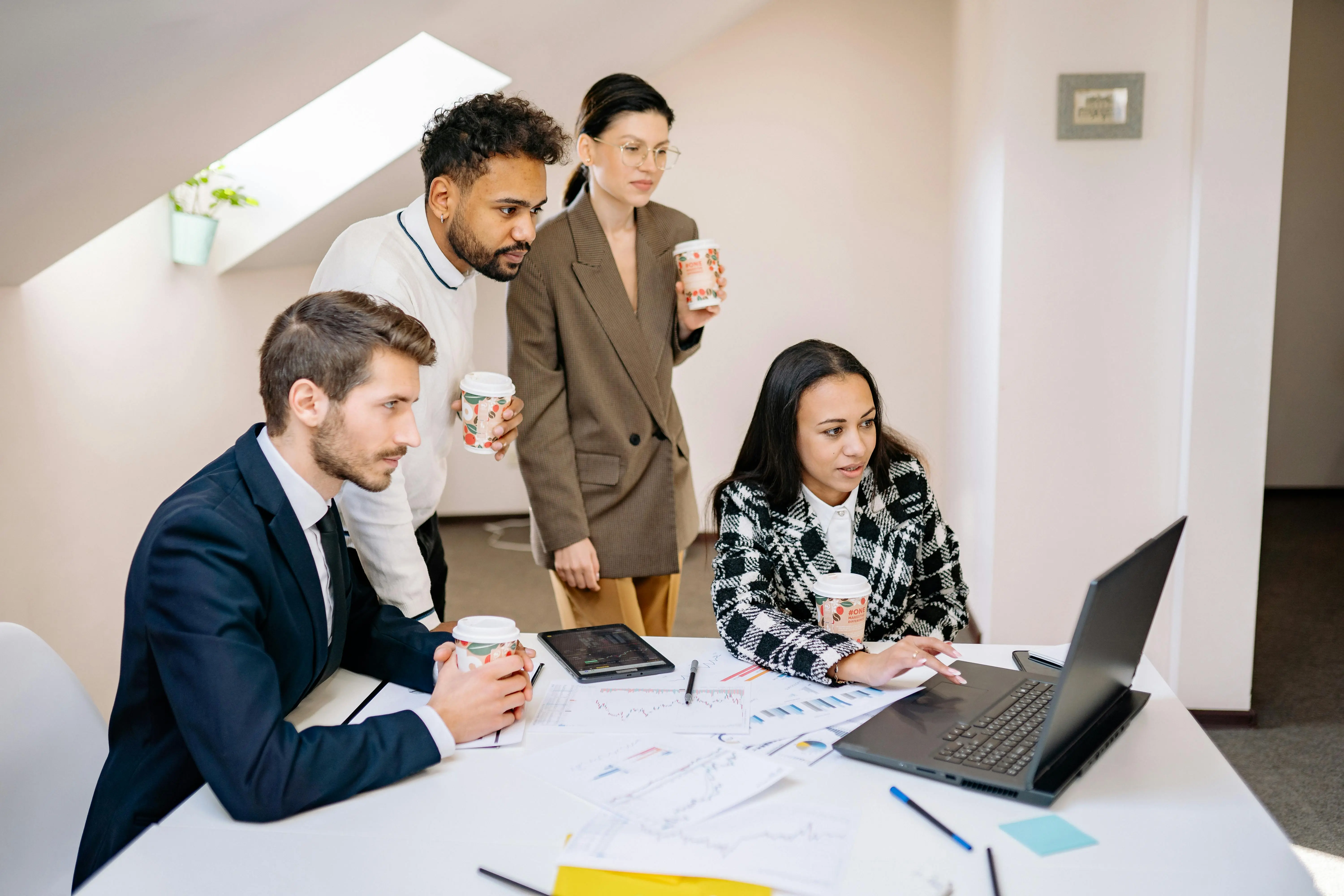 AI-native team building — founder working with digital tools and lean systems