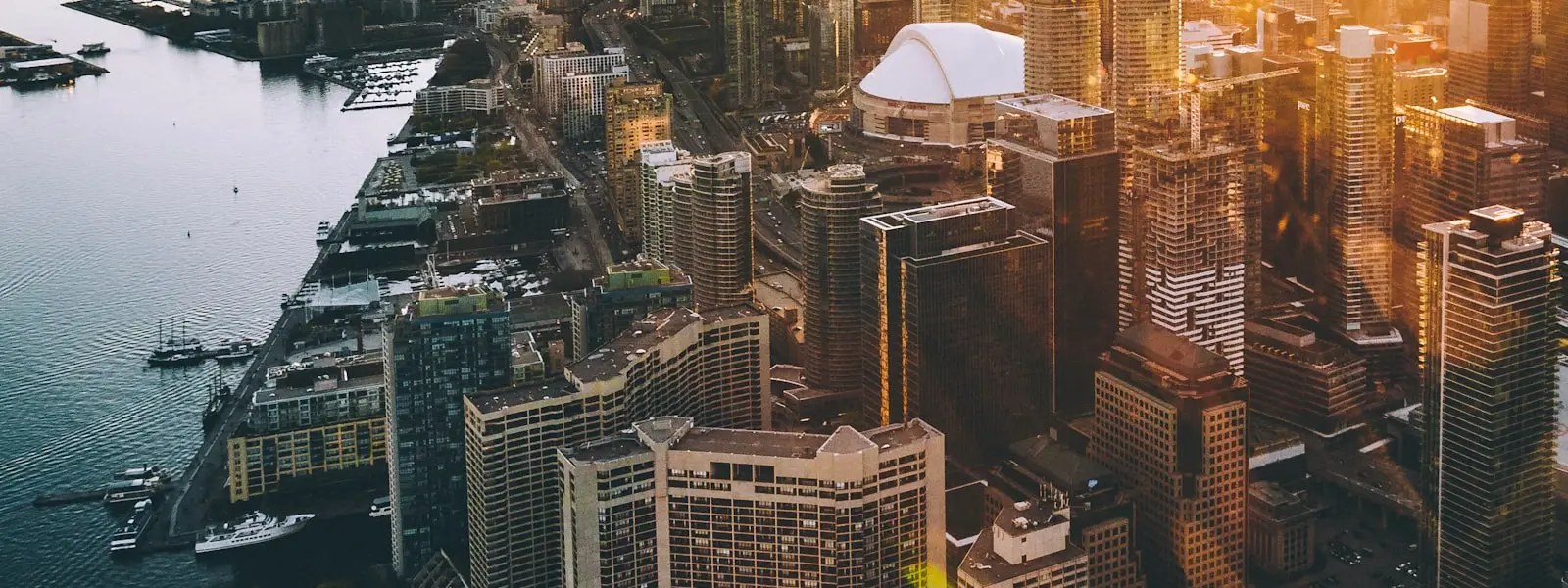Toronto city skyline at dusk — where most Indian Express Entry permanent residents settle in Canada