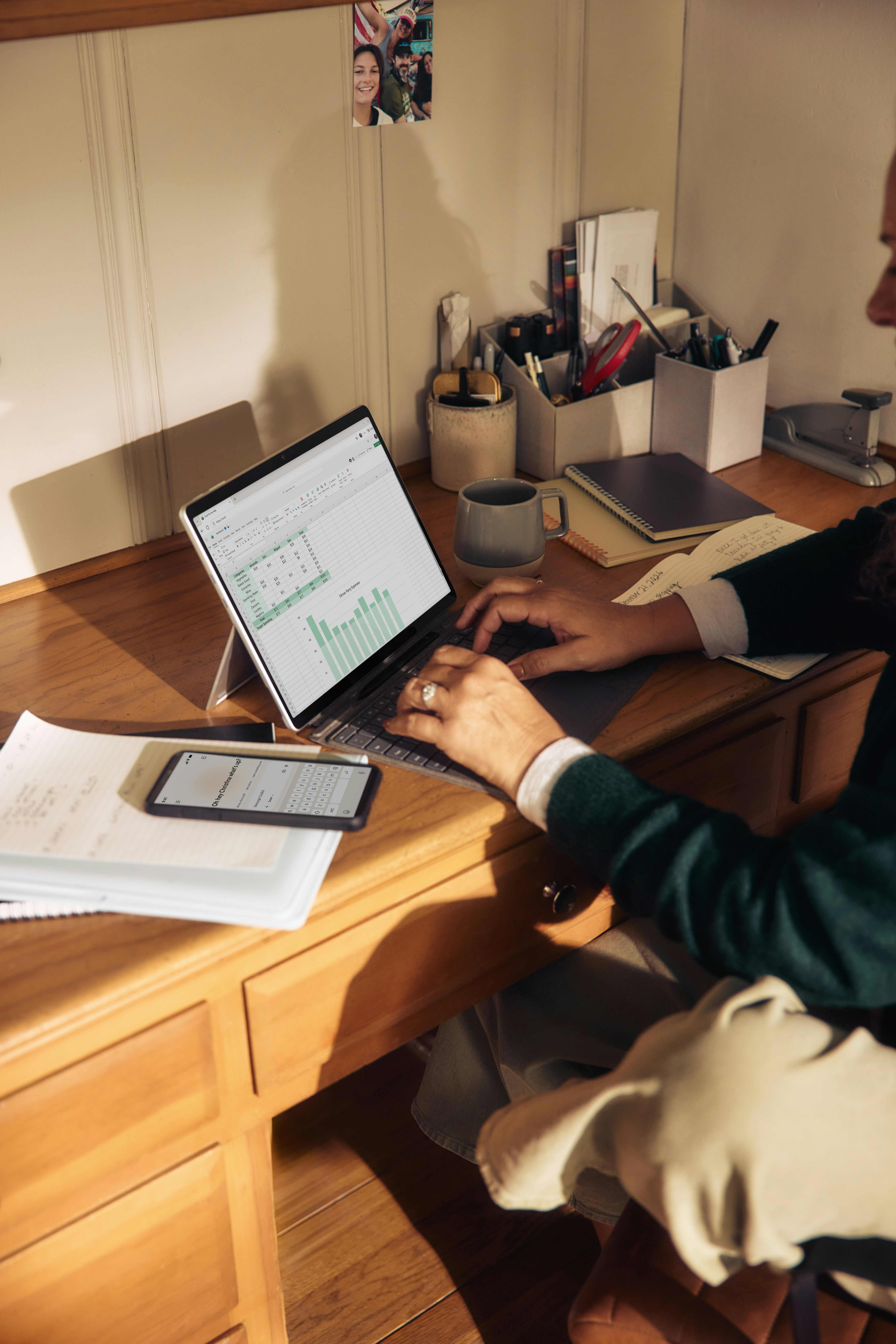A small business owner reviews client engagement data on a laptop, looking for disengagement signals before a client decides to churn