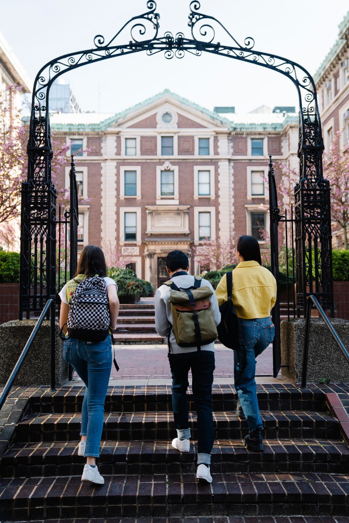 Indian student carrying a backpack and books, preparing to study abroad in Canada