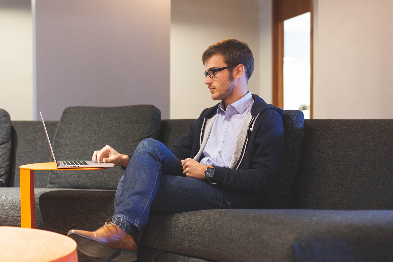 A small business owner planning her next steps at a desk, representing the deliberate strategy behind AI initiatives that succeed