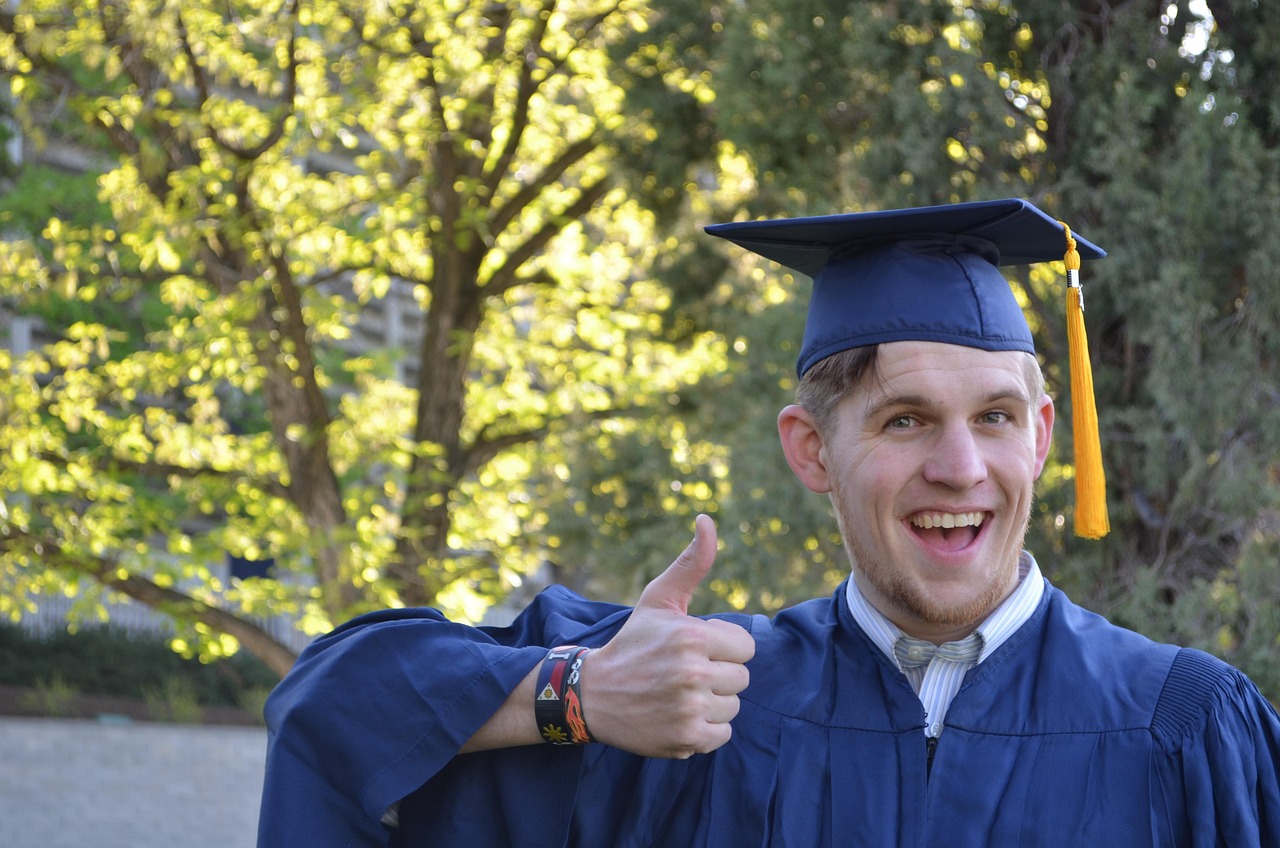 A graduate in a cap and gown, representing the growing number of degree holders entering a tighter Canadian job market