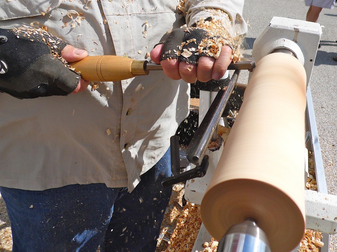 A craftsman working in a small workshop, representing the trades and service businesses whose value depends on skills and relationships rather than tasks AI can automate