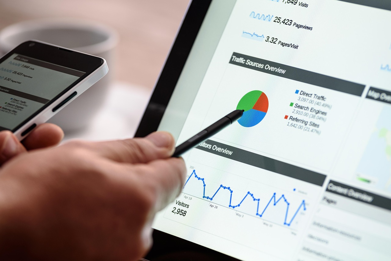 Digital marketing and search icons over a laptop, representing Google AI Overviews reshaping small business search traffic in 2026
