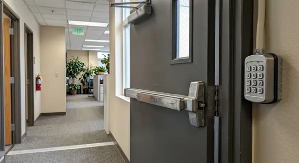exit panic bar with keypad on commercial door