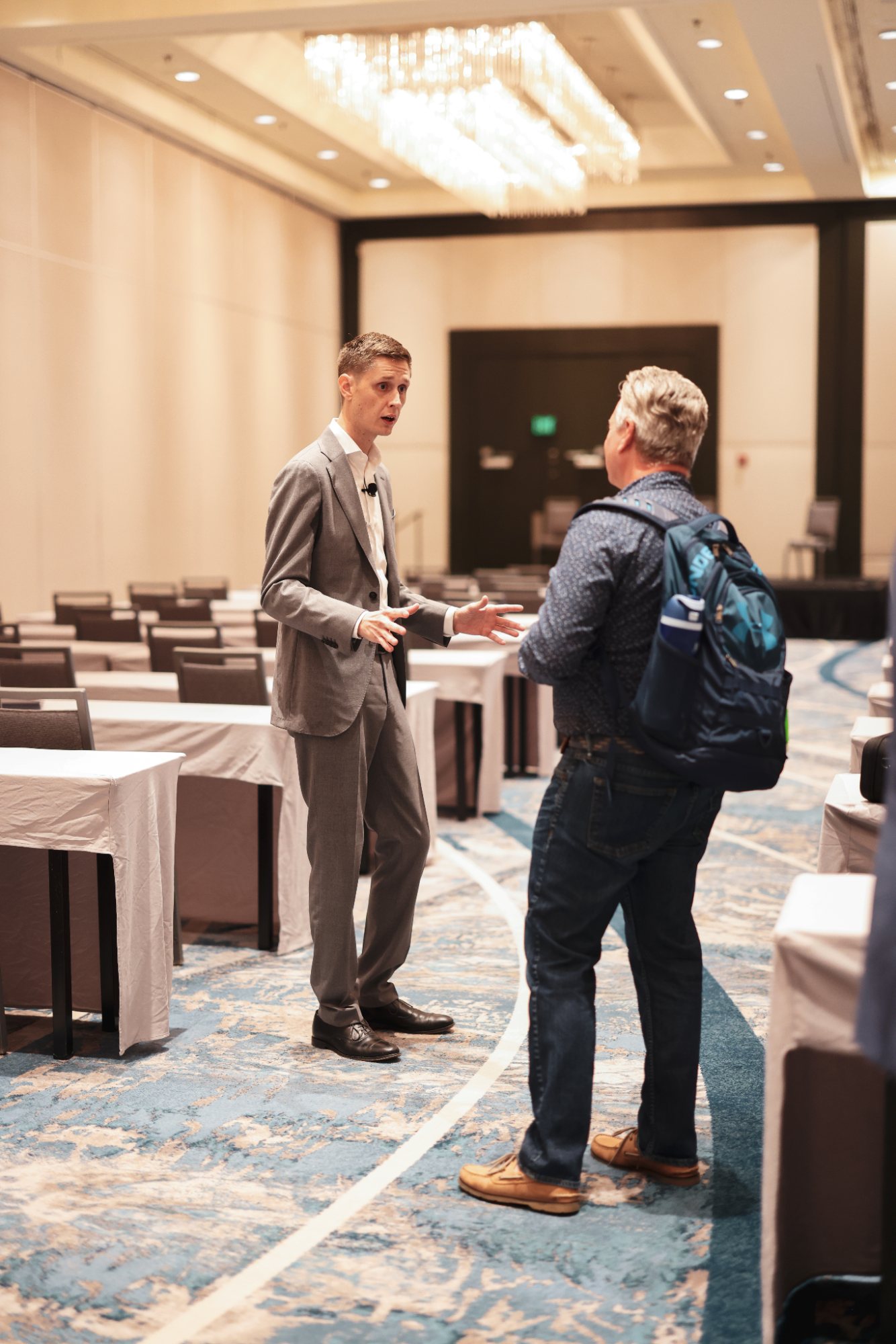 Cameron Smith with an agent at an NXTGEN event