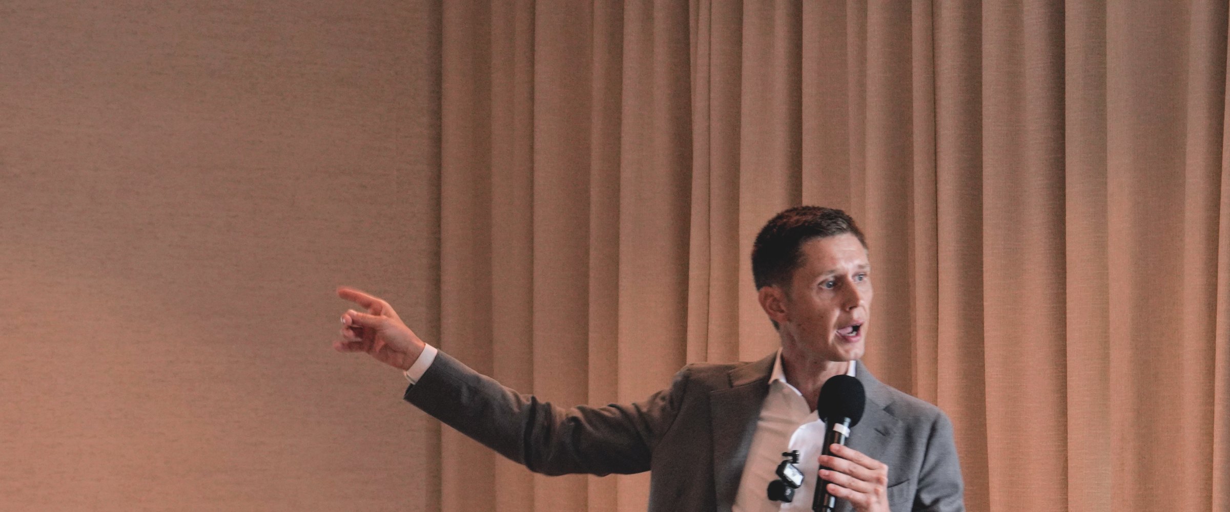 Cameron Smith speaking at an NXTGEN event