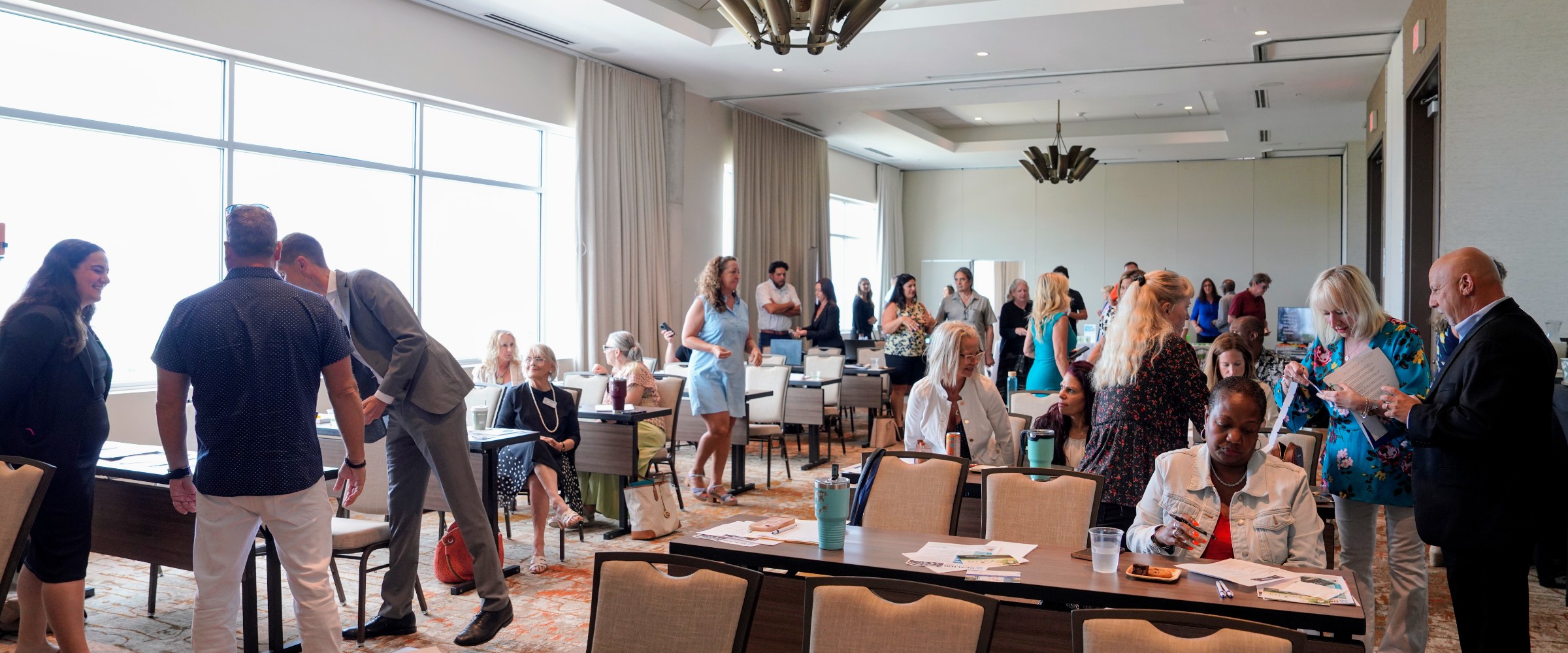 Agents arriving for an NXTGEN Agent session at an eXp Realty event