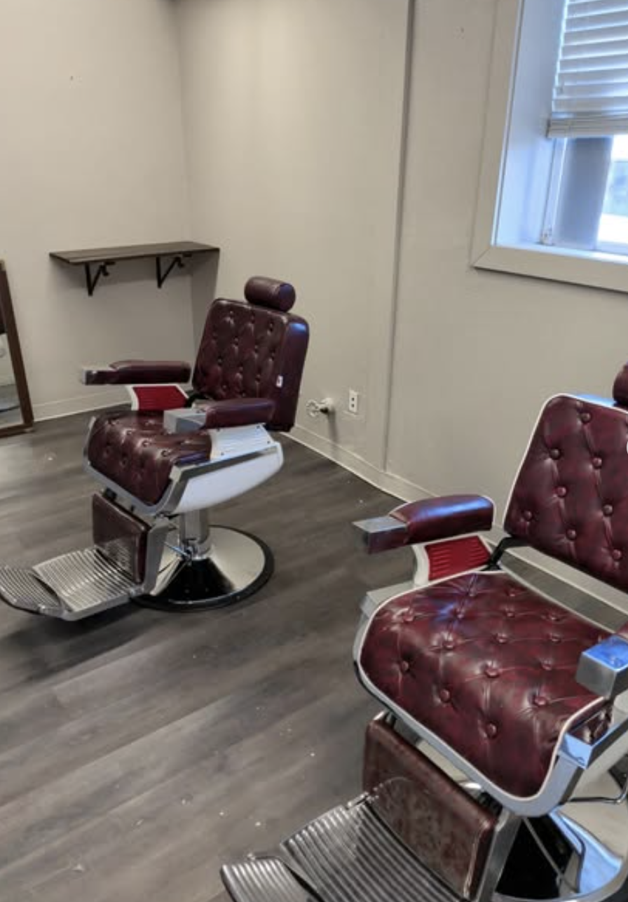 Interior barber chairs at Pop's Barbershop in Denton