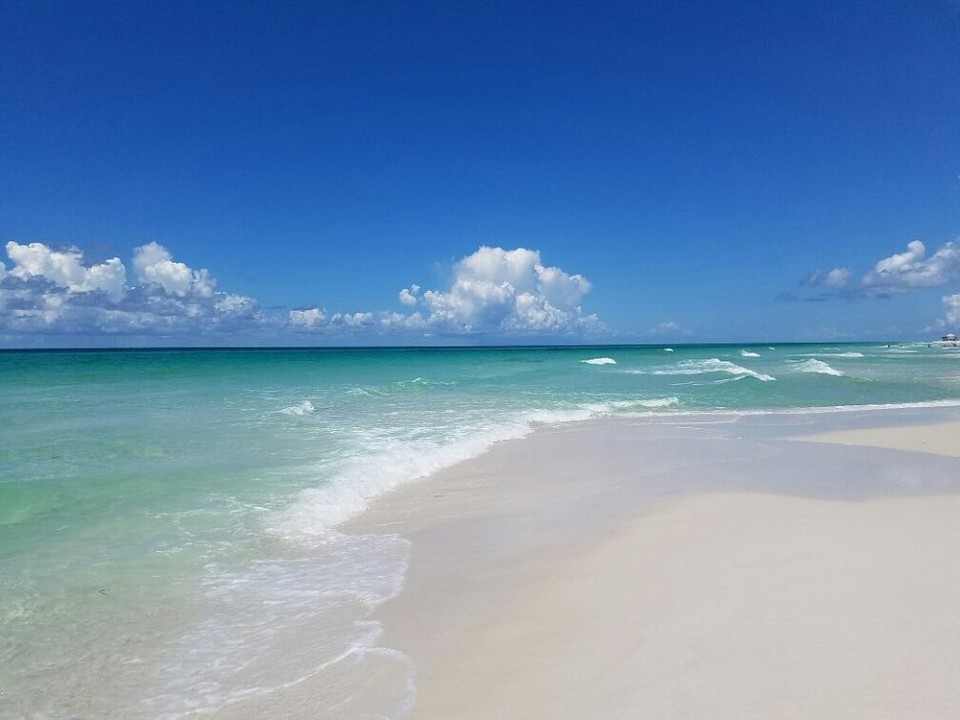 Emerald waters and sugar-white sands await