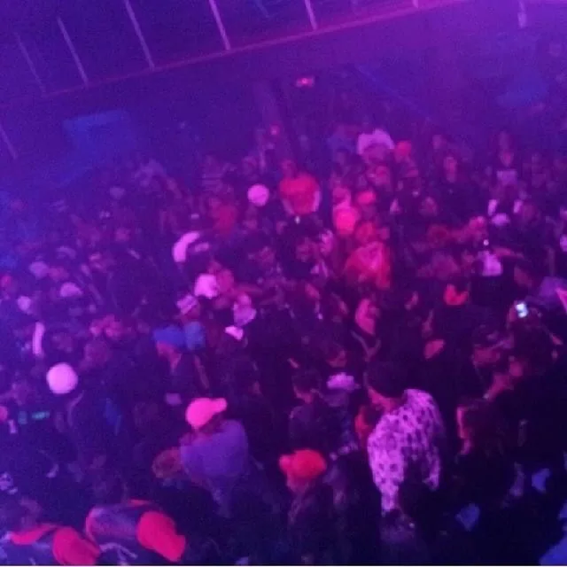 Winning Wednesdays crowd at Adrianna’s under purple stage lighting