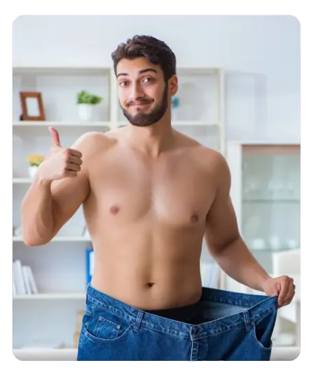 Homme montrant fièrement sa perte de poids avec un large pantalon, signe d'une transformation réussie