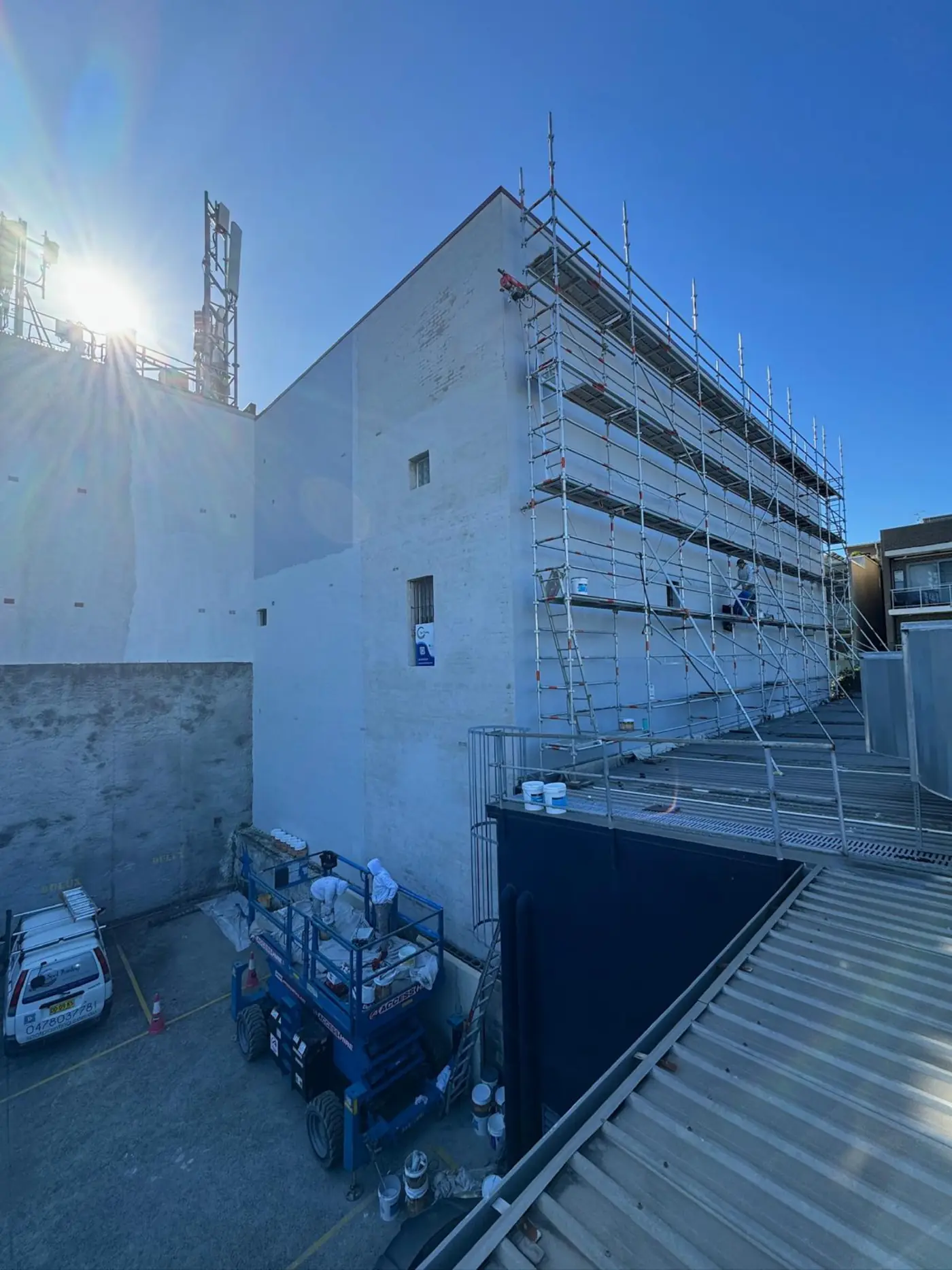 Remedial and waterproofing Sydney — building facade under repair by Spot Painting