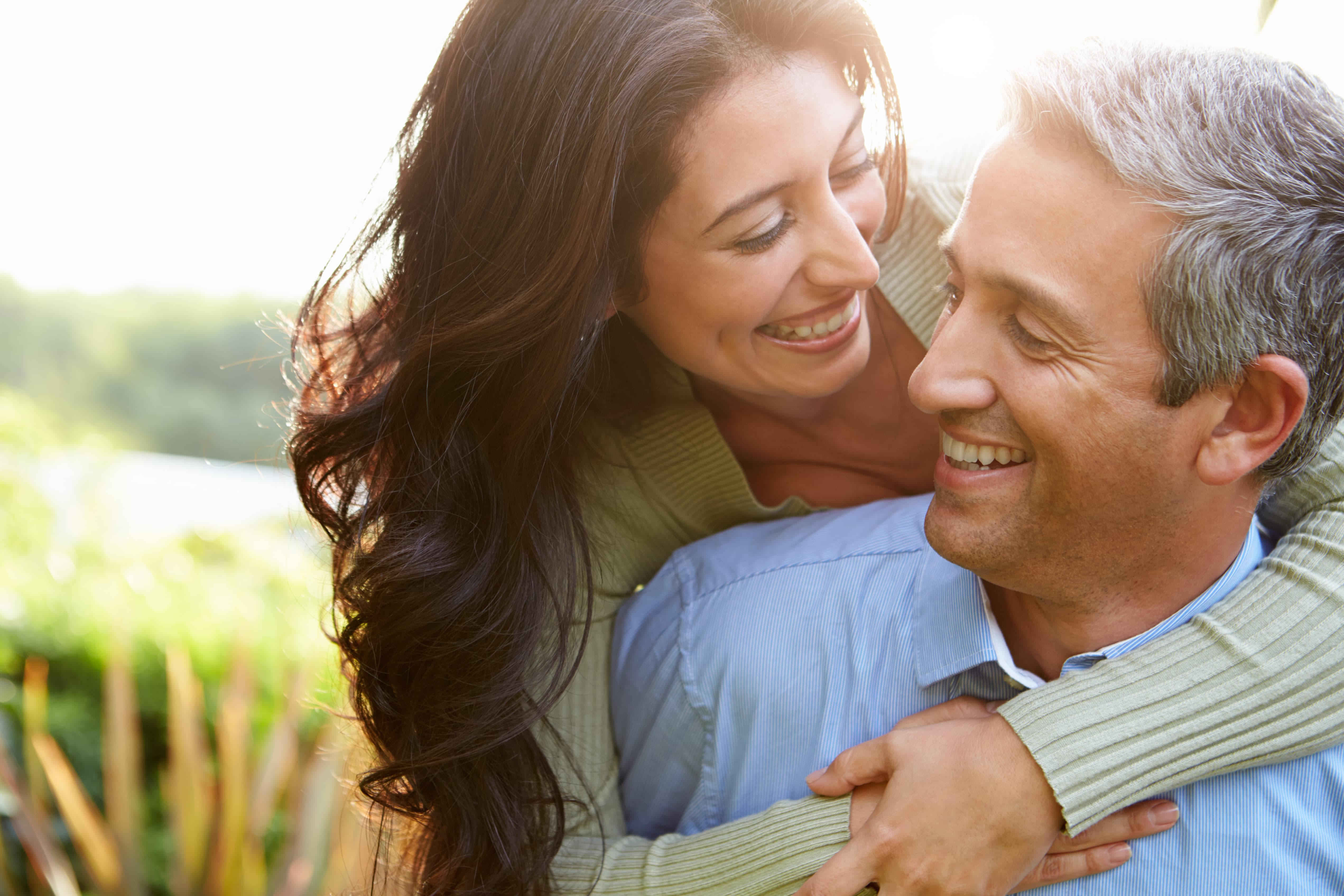 Happy woman enjoying life after hormone therapy