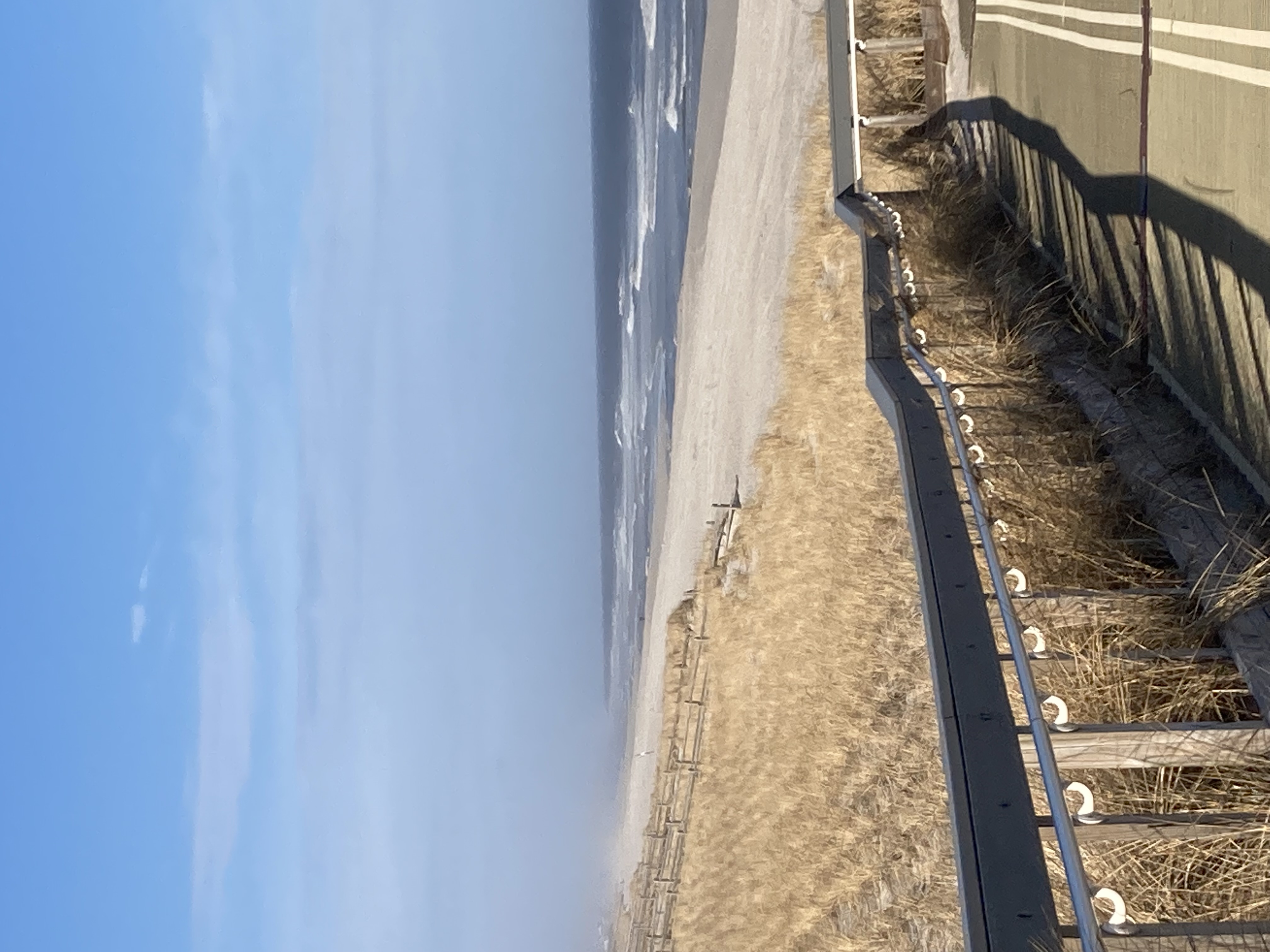 Boardwalk path through the dunes to the beach