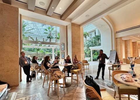 Corporate seminar with elegant table settings and centerpieces