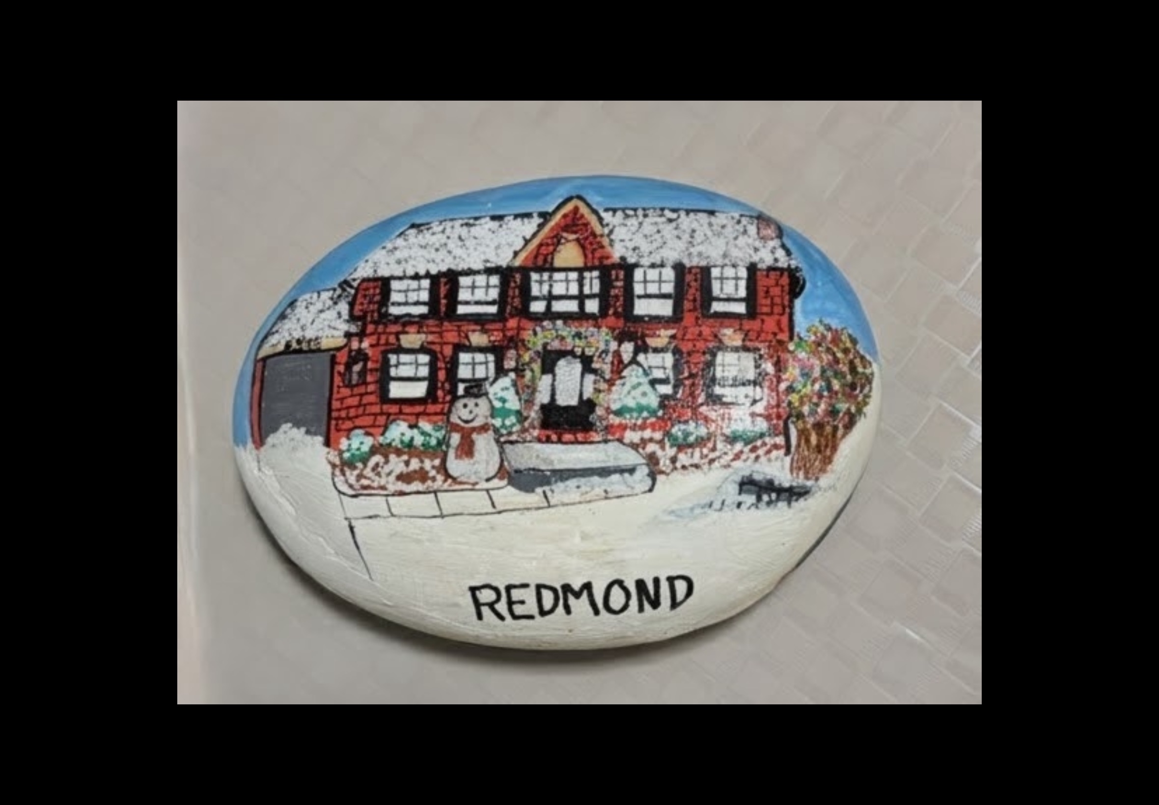 Custom painted rock with personal artwork