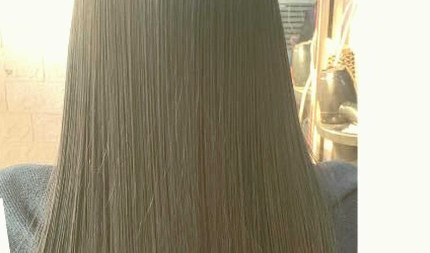 Hair after a rebond and treatment at Gwenella Beauty Salon