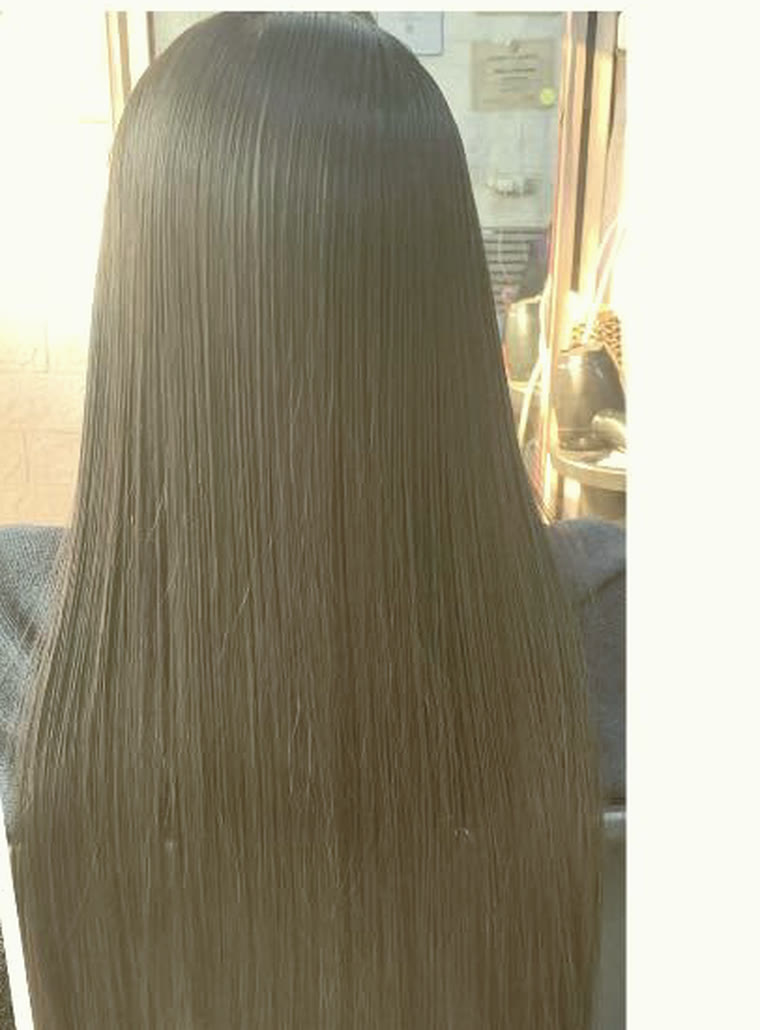 Long hair after a rebond and treatment