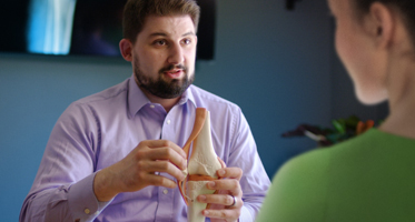 Dr. Ben Wyant speaking to a patient